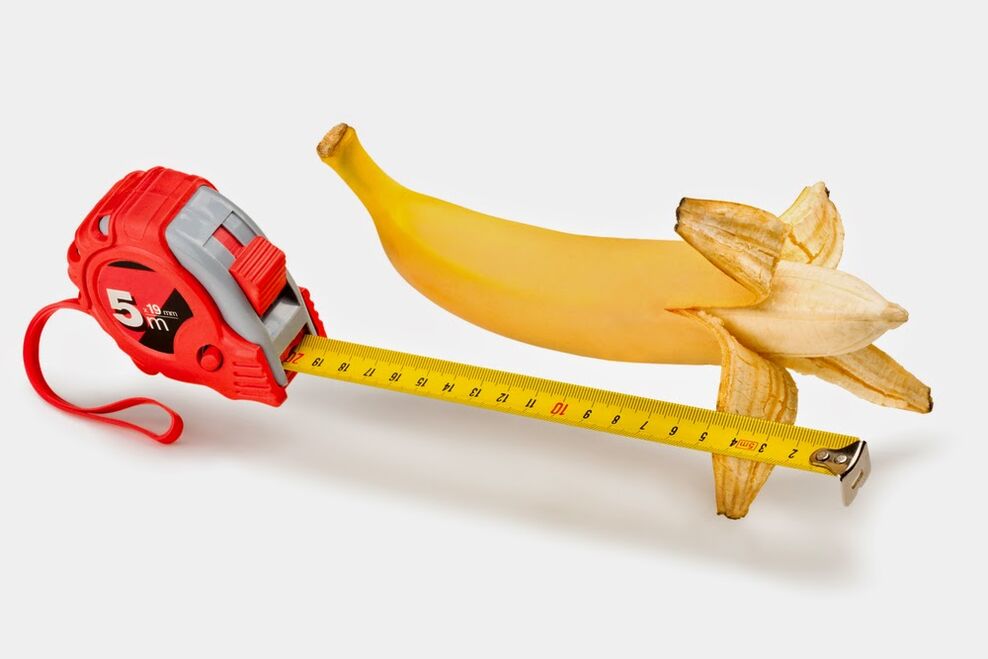 Measuring the penis before enlargement using a banana as an example